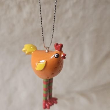<span class="jp_product_title">Hängande tupp Orange Kropp</span>